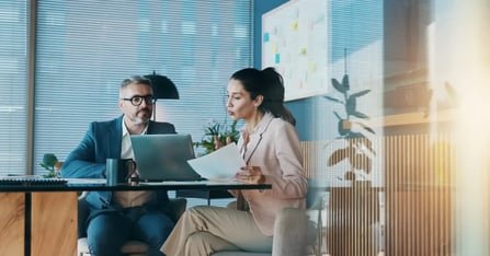 Executive Assistant sharing the in-person meeting budget plan to her executive