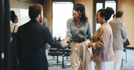 Executive Assistants networking at an event