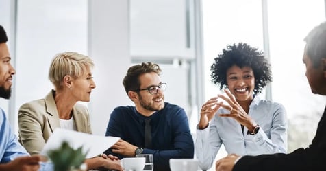 Team collaborating on culture and in-person meetings